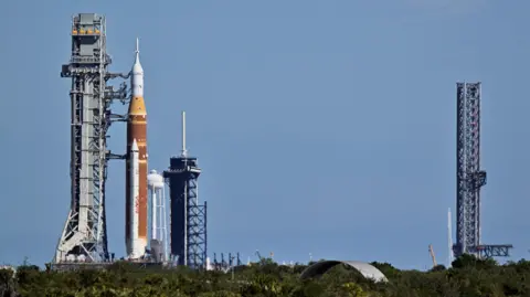 Artemis II moving from the space launch system to the launch pad