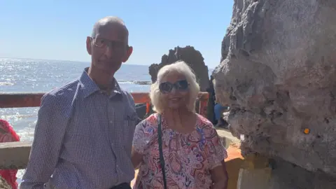 Supplied The Jansaris posing by the sea in sunny India