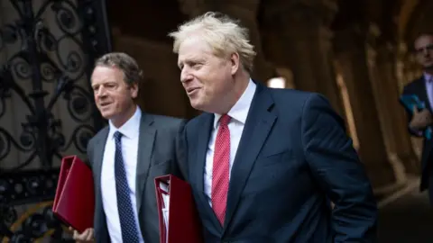 Getty Images Alister Jack continues to stand behind Boris Johnson