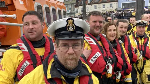 Nicky King and the crew of Wells lifeboat with the Doris M Mann of Ampthill on her last day.