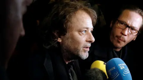 AFP French director Christophe Ruggia giving a press conference in 2015