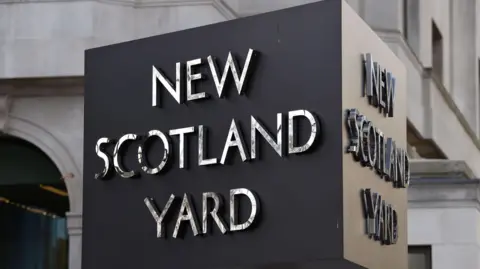 PA Media New Scotland Yard sign