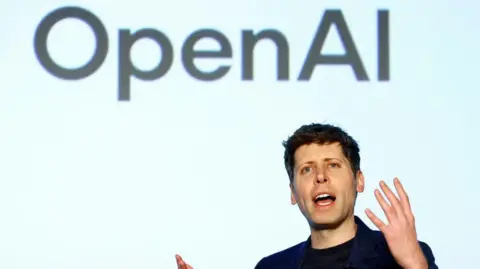 Reuters Sam Altman speaks while wearing a black shirt and dark blue jacket