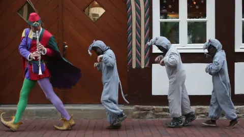 Sean Gallup A re-enactment of the Pied Piper of Hamelin