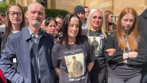 John’s father Johnny McNab, mother Lisa Petrie, his girlfriend Amy Burns and sister Lilly (correct) Miller, outside the high court in Dundee