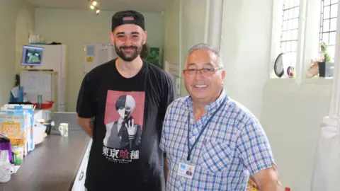 Light Project Peterborough Sav and Michal smiling for the camera 