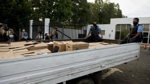 EPA Police agents remove boxes with documents from the newspaper La Prensa after a search operation at the headquarters of the publishing house in Managua, Nicaragua, 13 August 2021