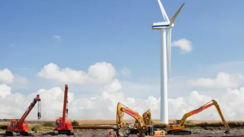 Getty Images A wind turbine being built near Workington