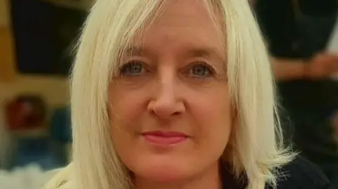 Tammy Mills Close up shot of Tammy Mills, looking at the camera