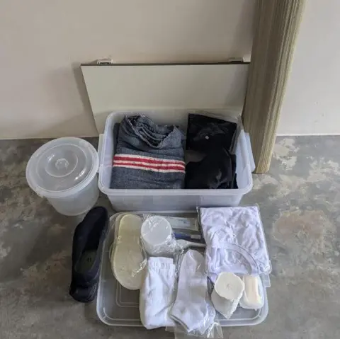 Singapore Prison Service Items including flip-flops, T-shirt, socks and a rush mat, supplied to inmates at Singapore's Drug Rehabilitation Centre 