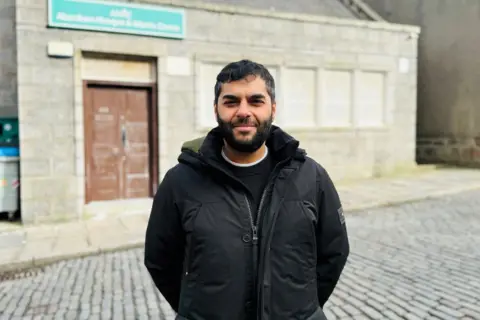 Man - Naveed Mohammed, chairman of the Aberdeen Mosque and Islamic Centre - outside the mosque.