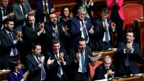 Reuters Senators clap Salvini