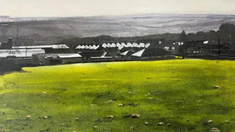 Narbi Price A painting called "We were at the sharp end, us" of a field of green with rocks scattered on it. In the background there are grey and black houses.