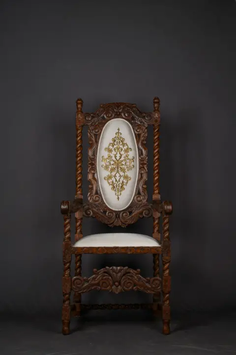 Vivek Gandhi A Carolean-style chair that was popular in 15th Century England was sourced from an old furniture shop in India and restored. It features intricate embroidery work done with gold thread.