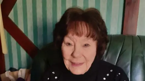 Handout Josephine Smith sits on a sofa with a black jumper on