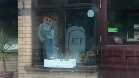 BBC Halloween gravestone window display at Dungannon Care Home