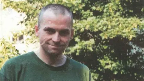 "Rosa" Undercover policeman Jim Boyling pictures in garden