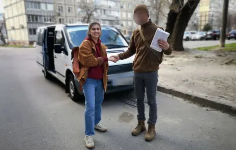 Anastasia Pavlova Anastasia handed the van back to a volunteer after returning safely