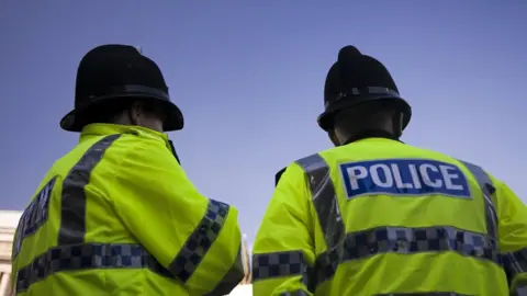 Getty Images Two policemen
