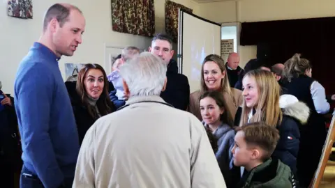 Anne Roberts Prince William talking to members of the public