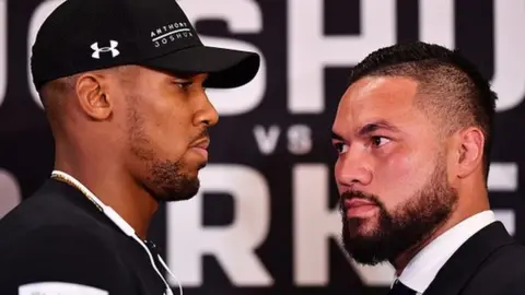 Getty Images Anthony Joshua (left) and Joseph Parker