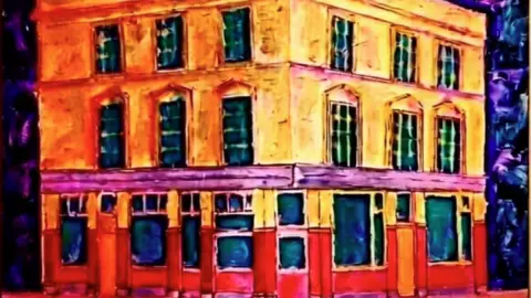 Gary North An impressionistic painting of a golden and red pub building against a purple background
