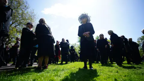 Ben Birchall Mourners dressed in black