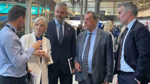 BBC/Spencer Stokes West Yorkshire Mayor Tracy Brabin, South Yorkshire Mayor Oliver Coppard, Lord Blunkett and York and North Yorkshire Mayor David Skaith in conversation at Leeds railway station