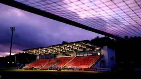 The Mark Farren Stand at the Ryan McBride Brandywell Stadium at night