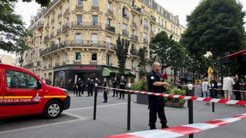 Police cordoned off the area close to where a car crashed into a restaurant in Paris