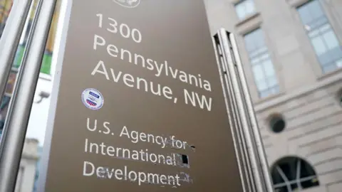 Remnants of tape after it was removed from signage at the US Agency for International Development (USAID) headquarters in Washington, DC, US, on Thursday, Feb. 27, 2025. 