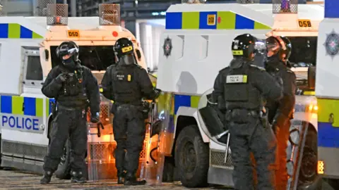 Two police Land Rovers