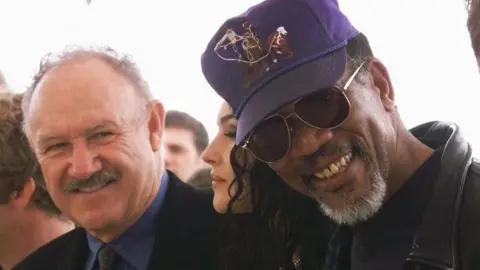 Getty Images Hackman and Freeman stand next to each other at the Cannes film festival