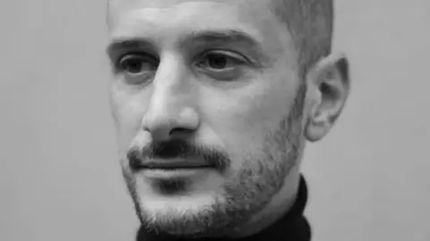 A black and white portrait photo of Antoni Lallican 