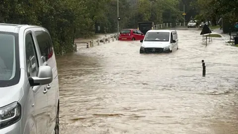 Sophie Myers Debenham High Street during Storm Babet