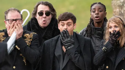 Celebrity Traitors gasp as Paloma Faith (out of shot) is buried