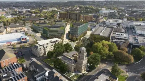 LDRS Drone shot of Blackburn with the church and its dome and surrounds of trees and other offices.