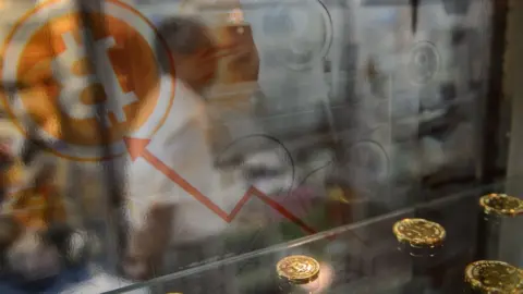 AFP/Getty Bitcoin models in Hong Kong