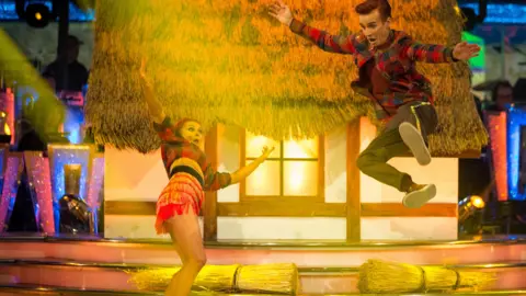 Dianne Buswell and Joe Sugg performing together on stage in 2018's Strictly