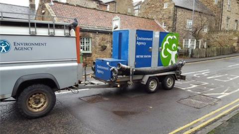 Pump dragged into position after flooding in Cowbridge 
