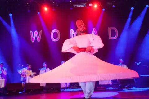 Mike Chapman A whirling dervish dances himself dizzy while Noureddine Khourchid, accompanied by six other Syrian singer-musicians, performs a series of sacred Sufi songs known as "inshads".