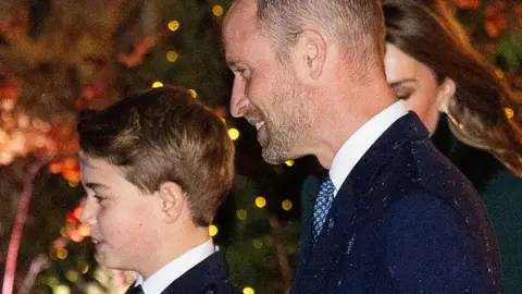 Getty Images Prince George and the Prince of Wales at the carol concert at Westminster Abbey in December 2025
