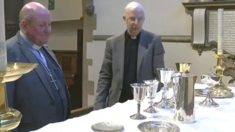 BBC Methodist Minister Rev Andrew Farrington (left) and Anglican minister Eve Canon Neil Clarke