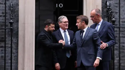 EPA Ukraine's President Volodymyr Zelensky, France's President Emmanuel Macron, British Prime Minister Keir Starmer and Germany's Chancellor Friedrich Merz on the steps of Downing Street