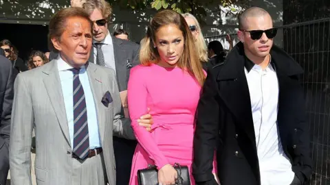 Getty Images Valentino Garavani, Jennifer Lopez and Casper Smart arrive at the Valentino Spring / Summer 2013 show as part of Paris Fashion Week at Espace Ephemere Tuileries on October 2, 2012 in Paris, France. 