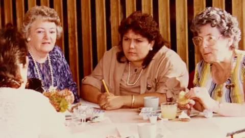 A meeting of a women's support group for miners