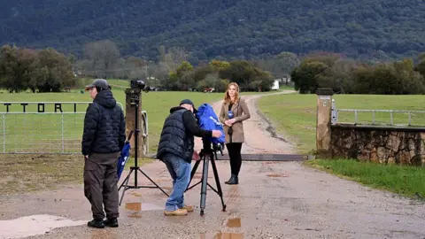 Getty Images Media report from a roadblock to a rural property in Porepunkah