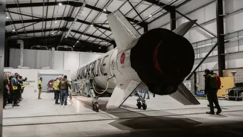 UK Space Agency A rear view of Virgin Orbit's LauncherOne rocket at Spaceport Cornwall, at Cornwall Airport in Newquay