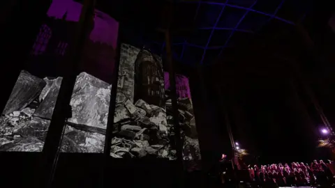 Coventry UK City of Culture 2021 Artworks during rehearsals projected onto the cathedral walls