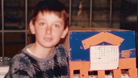 Family photo Stewart when he was 10 with a home-made slot machine